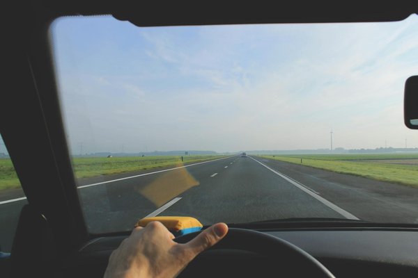 How can you maintain and care for a retractable hardtop convertible in the UK's variable climate?